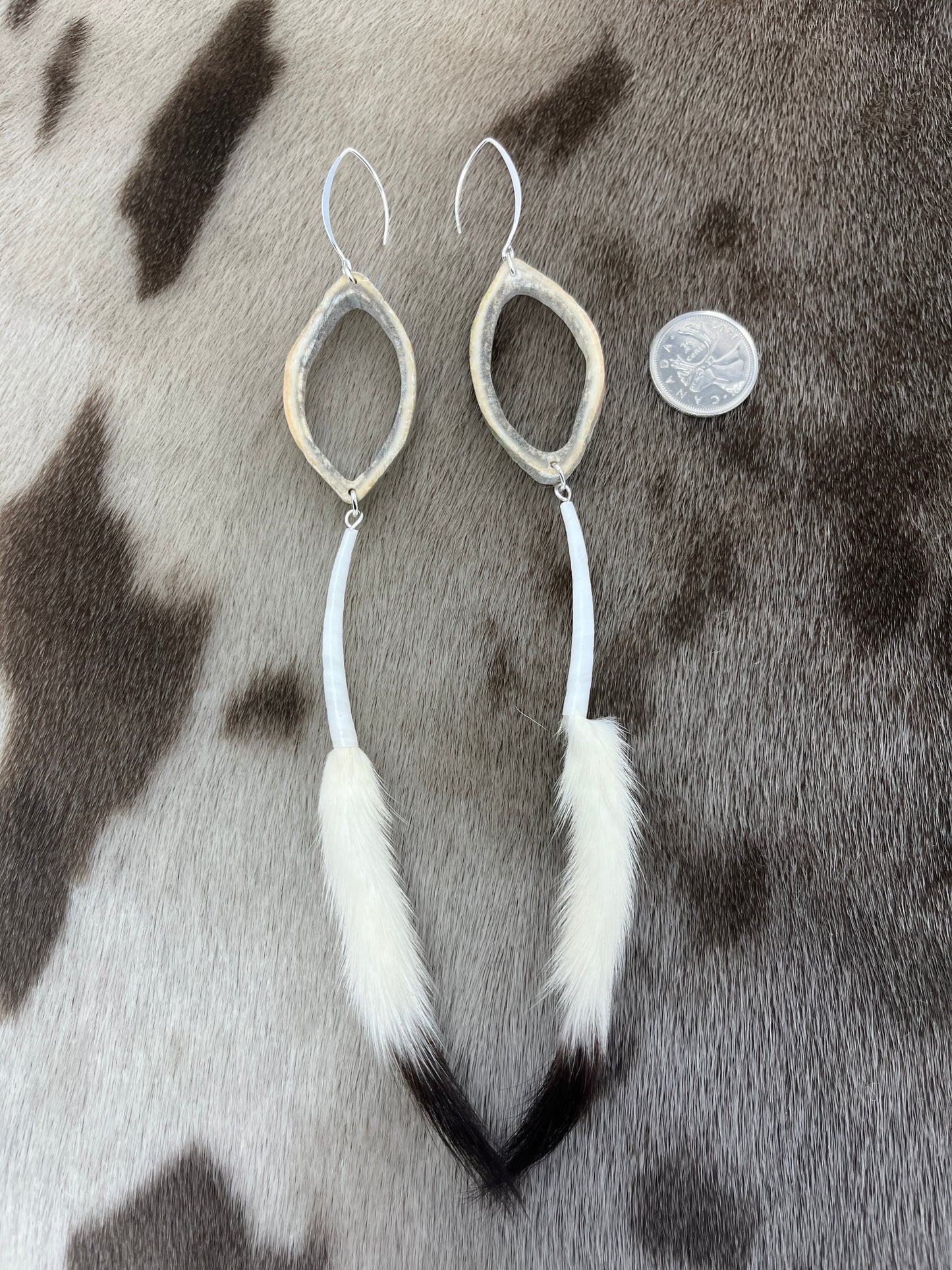 Carved Caribou & Ermine Single